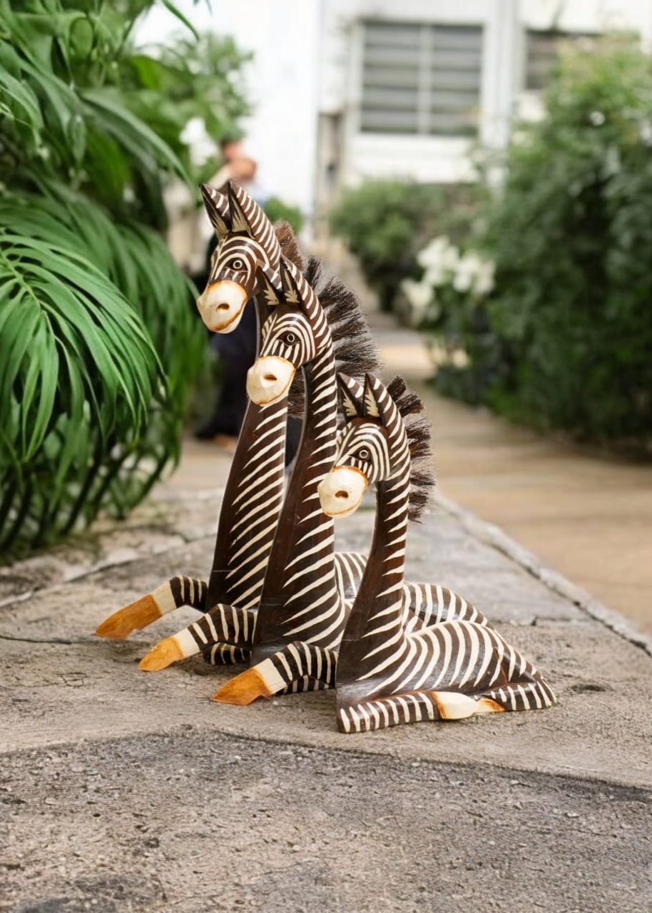 HAND-CARVED WOODEN ZEBRA TRIO