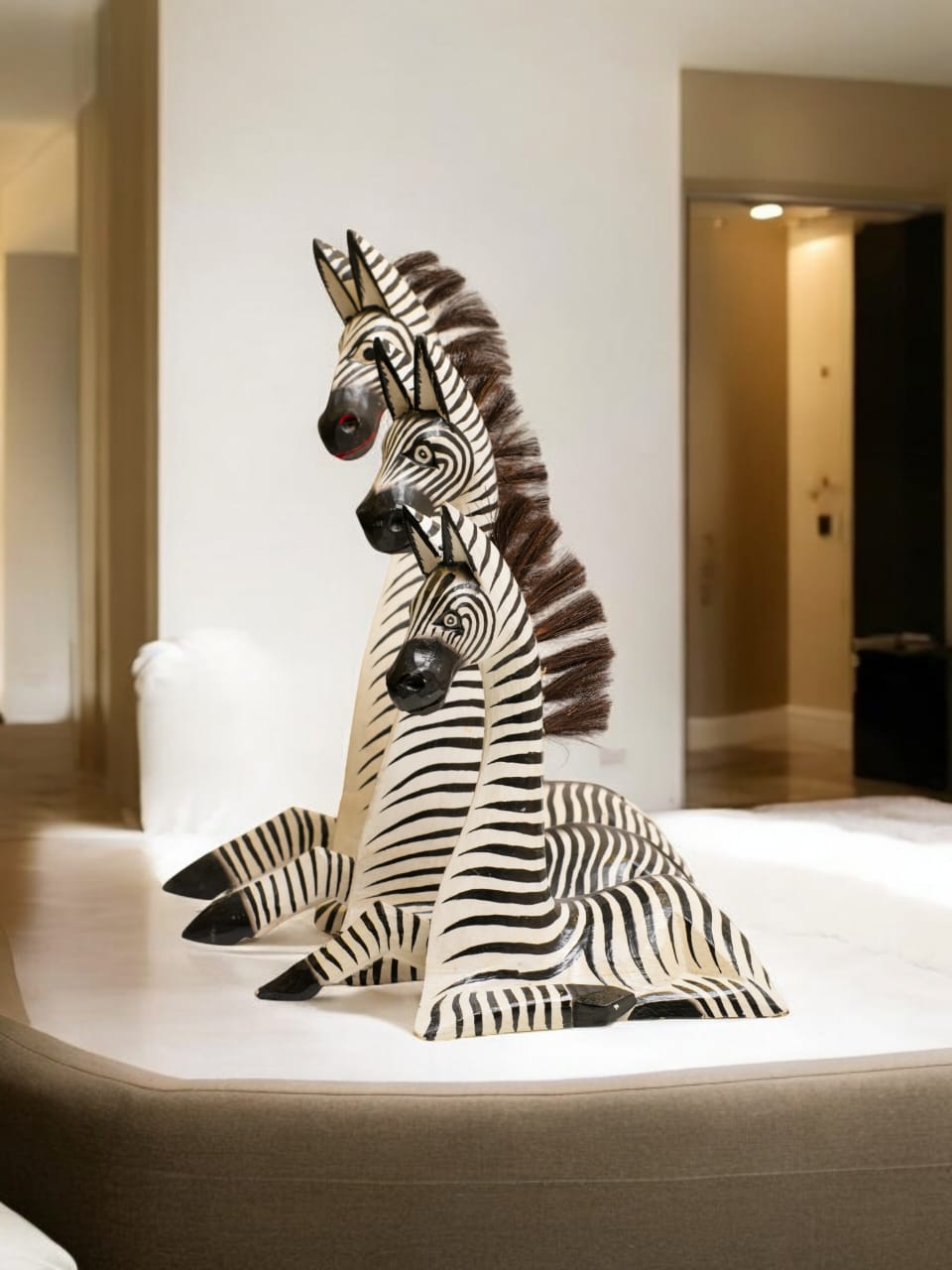 HAND-CARVED WOODEN ZEBRA TRIO