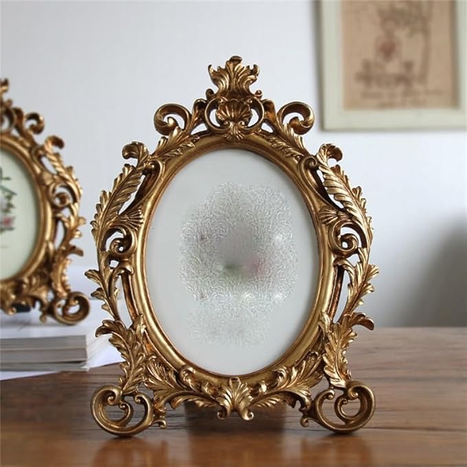 Ornate golden photo frame with vintage European design, ideal for classic interiors