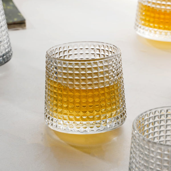 Six wave-patterned glasses for whiskey
