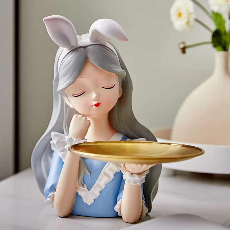 Chic girl figurine featuring a tray for holding keys, jewelry, or treats