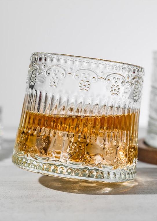 Elegant glass tumbler with retro detailing