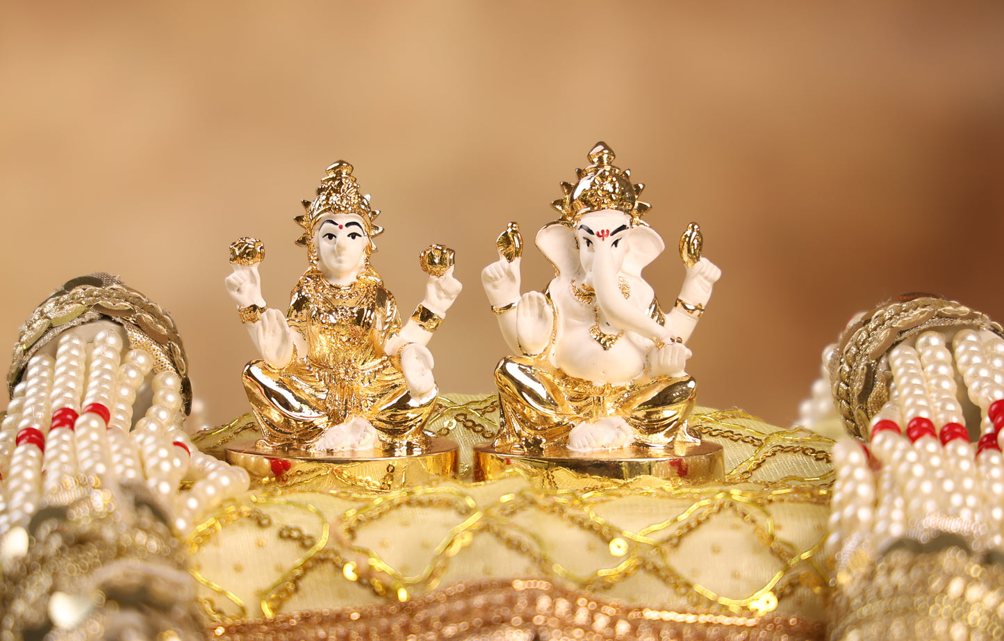 Divine Duo Figurines – Lakshmi & Ganesha In Gold