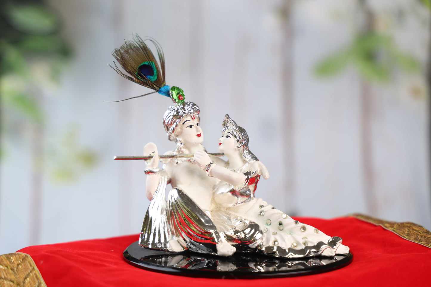 Silver Plated White Sitting Radha Krishna on a Black Acrylic Plate