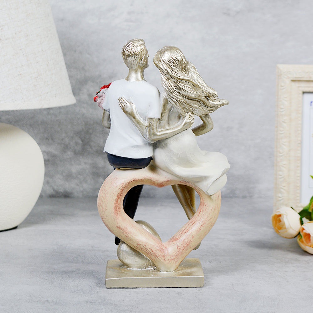 Beautifully crafted polyresin couple statue showcasing love and togetherness