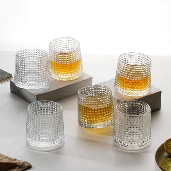 Six diamond-cut whiskey glasses