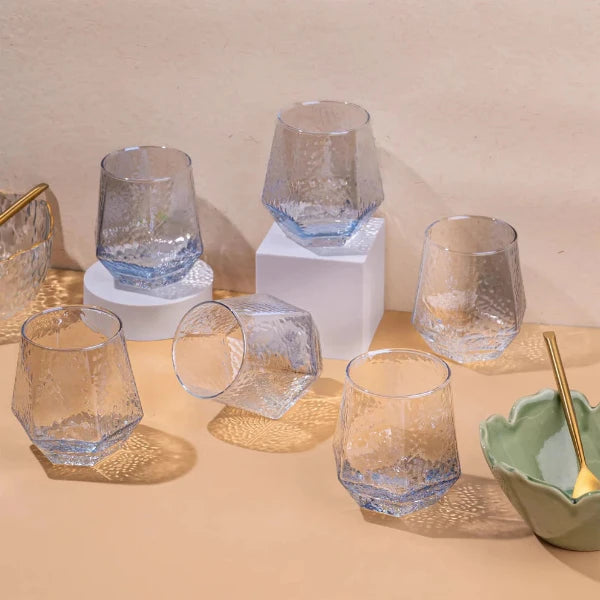 Stylish amber whiskey glasses in hex form