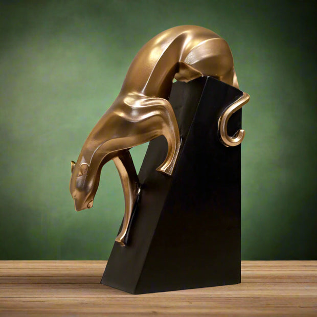 Artistic resin sculpture of a walking panther in metallic bronze finish