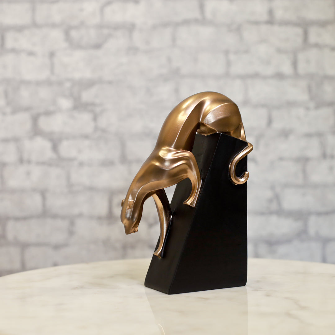 Bold panther figurine crafted in resin and coated with rich bronze tones