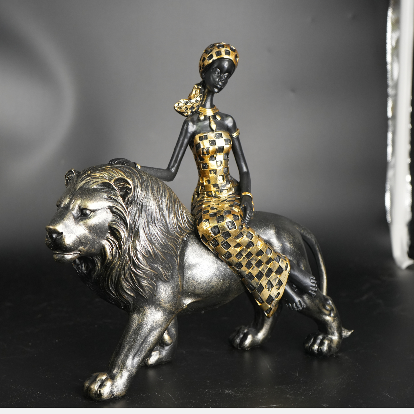Elegant African Lady with Lion Figurine