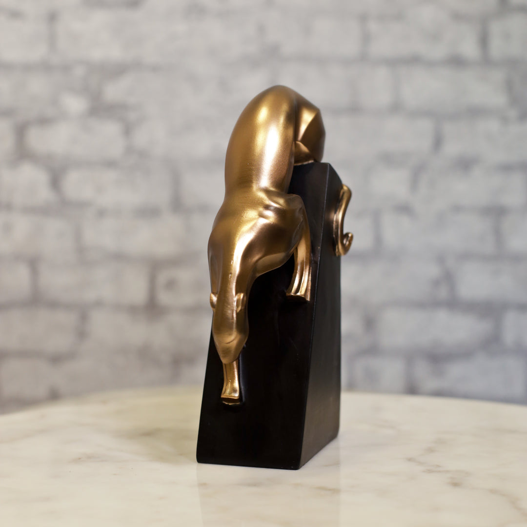 Panther showpiece in bronze-effect resin, showcasing strength and grace