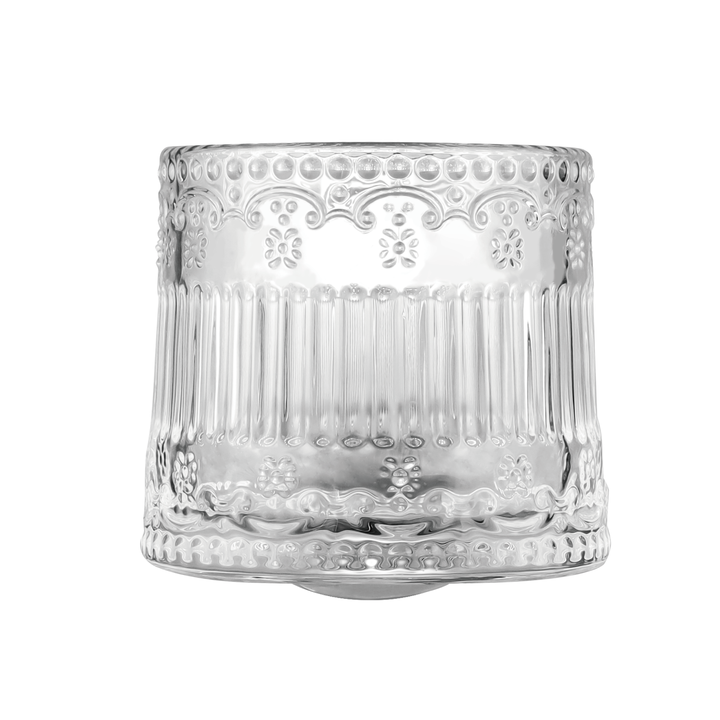 Short glass with intricate cut pattern