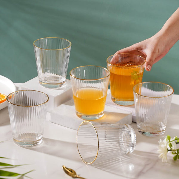 Elegant short glasses with gold rim accents