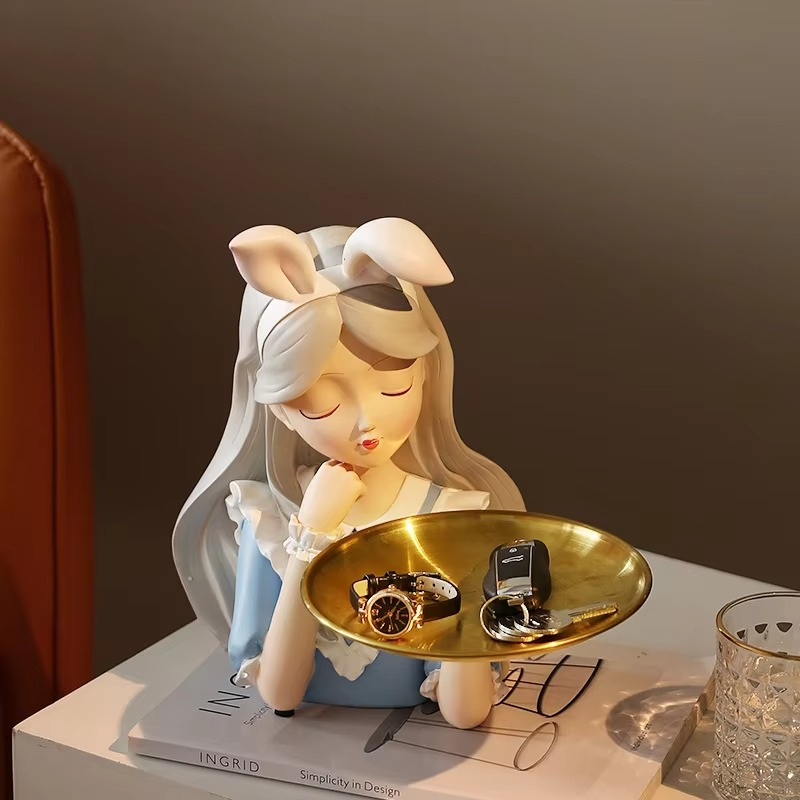 Artistic girl statue designed with a functional tray for elegant home display