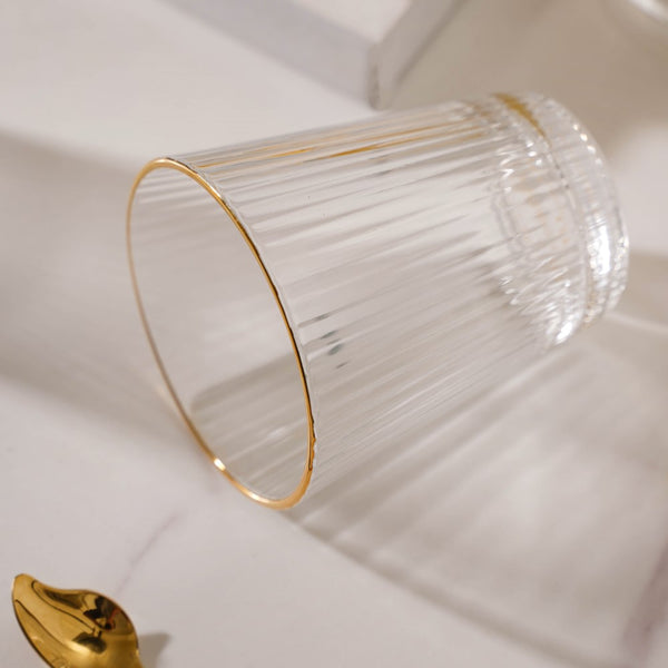 Set of six short ribbed glasses with gold trim