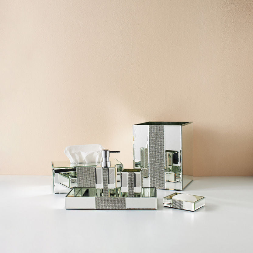 Mirrored bathroom accessory set.