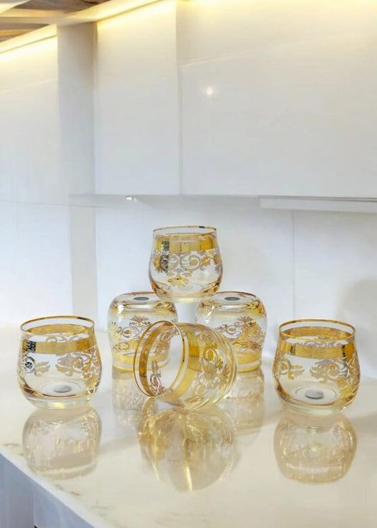 Elegant crystal glasses with embossed gold rim by Mirana Decoor
