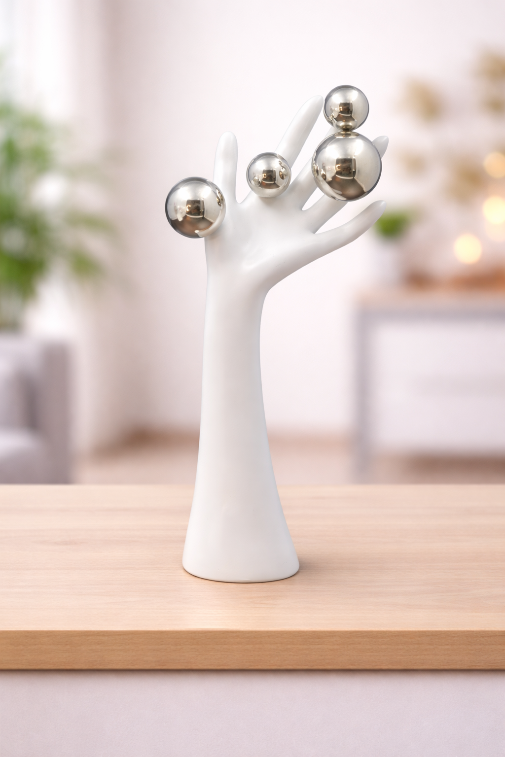 Abstract Hand Sculpture with Metallic Orbs