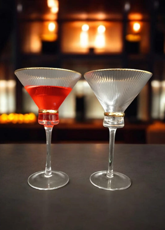 Elegant martini glasses with gold rims