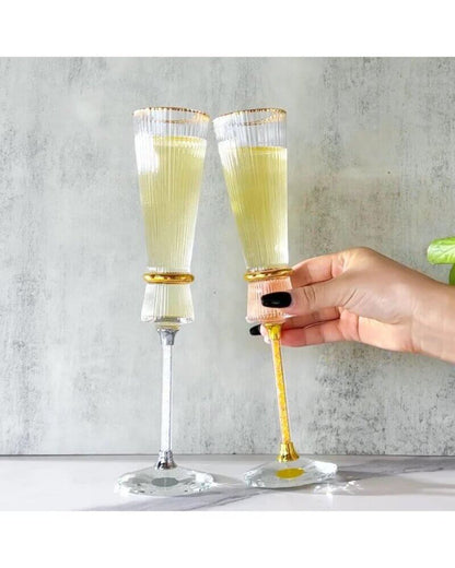 Stylish gold-rimmed champagne flutes for special occasions