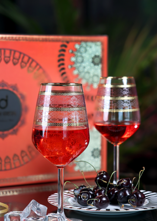 Elegant pink wine glasses with gold embossin