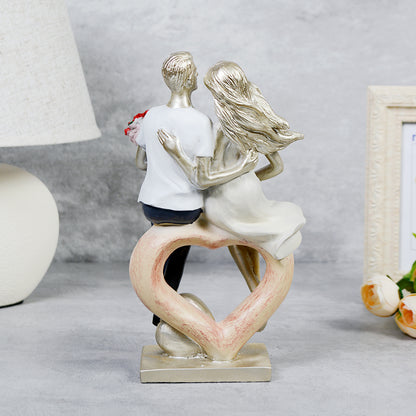 Beautifully crafted polyresin couple statue showcasing love and togetherness

