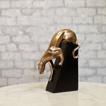 Bold panther figurine crafted in resin and coated with rich bronze tones

