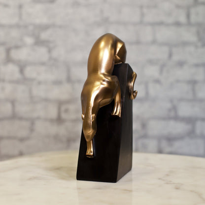 Panther showpiece in bronze-effect resin, showcasing strength and grace