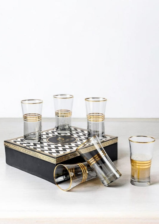 Six smokey glasses with elegant gold rims