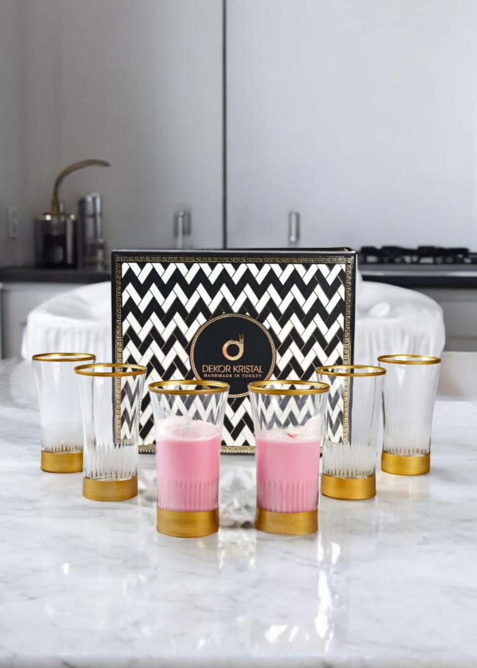 Six floral glasses with a golden wooden box